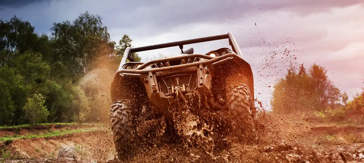 Mud-splattered off-road vehicle.